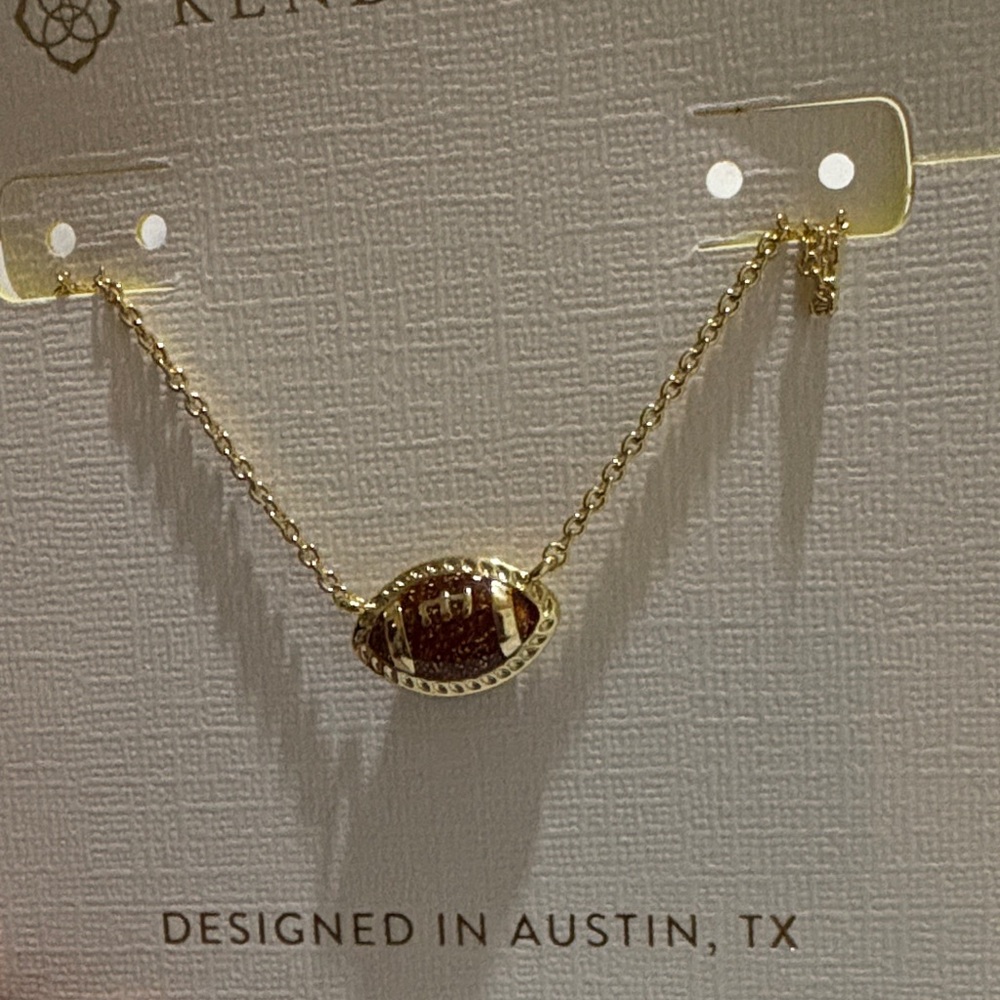 Kendra Scott Gold Necklace with Brown football Stone